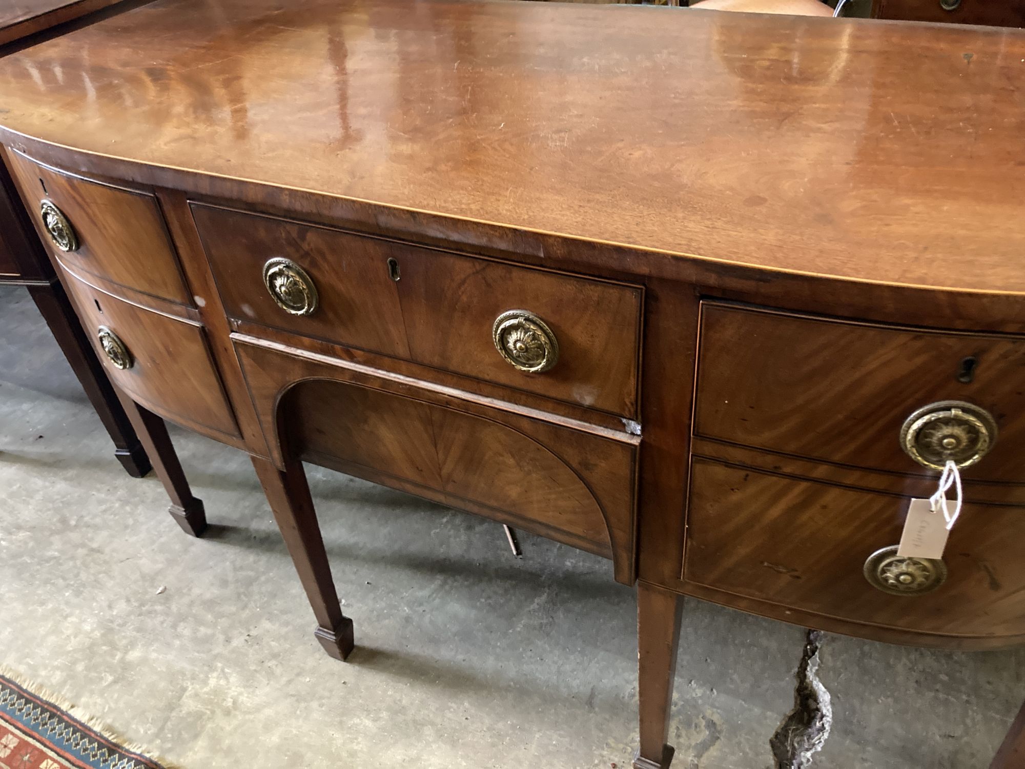 A George III mahogany bowfront sideboard, length 152cm, depth 65cm, height 92cm